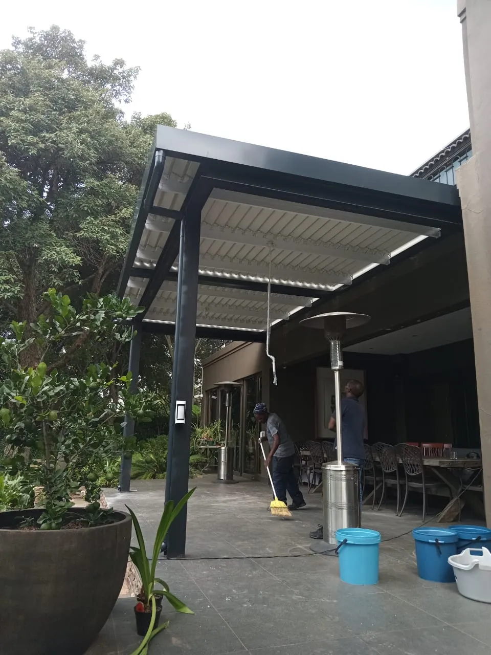 Charcoal aluminium awning on a modern home
