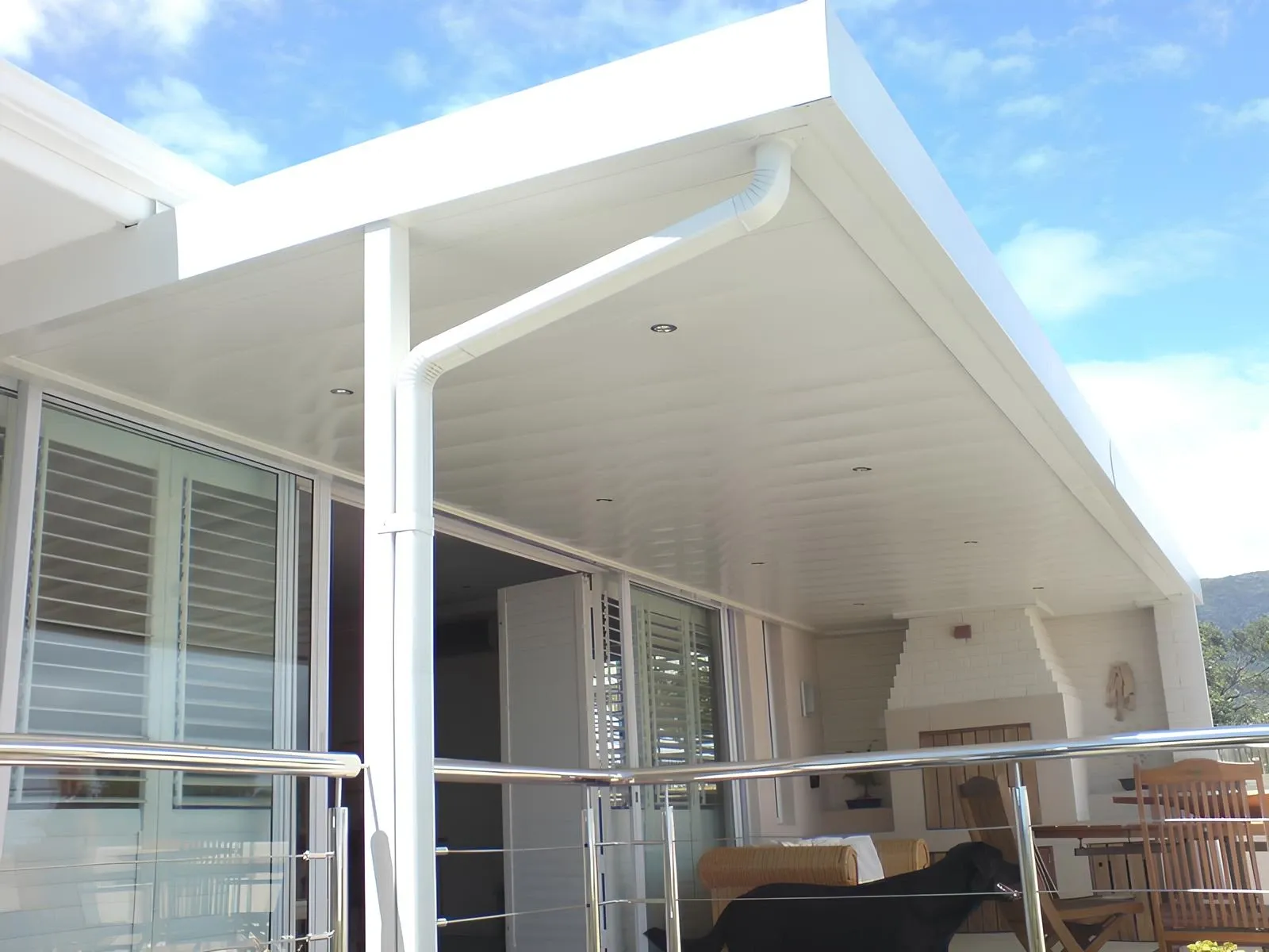 Crisp white patio ceiling fitted under a patio roof